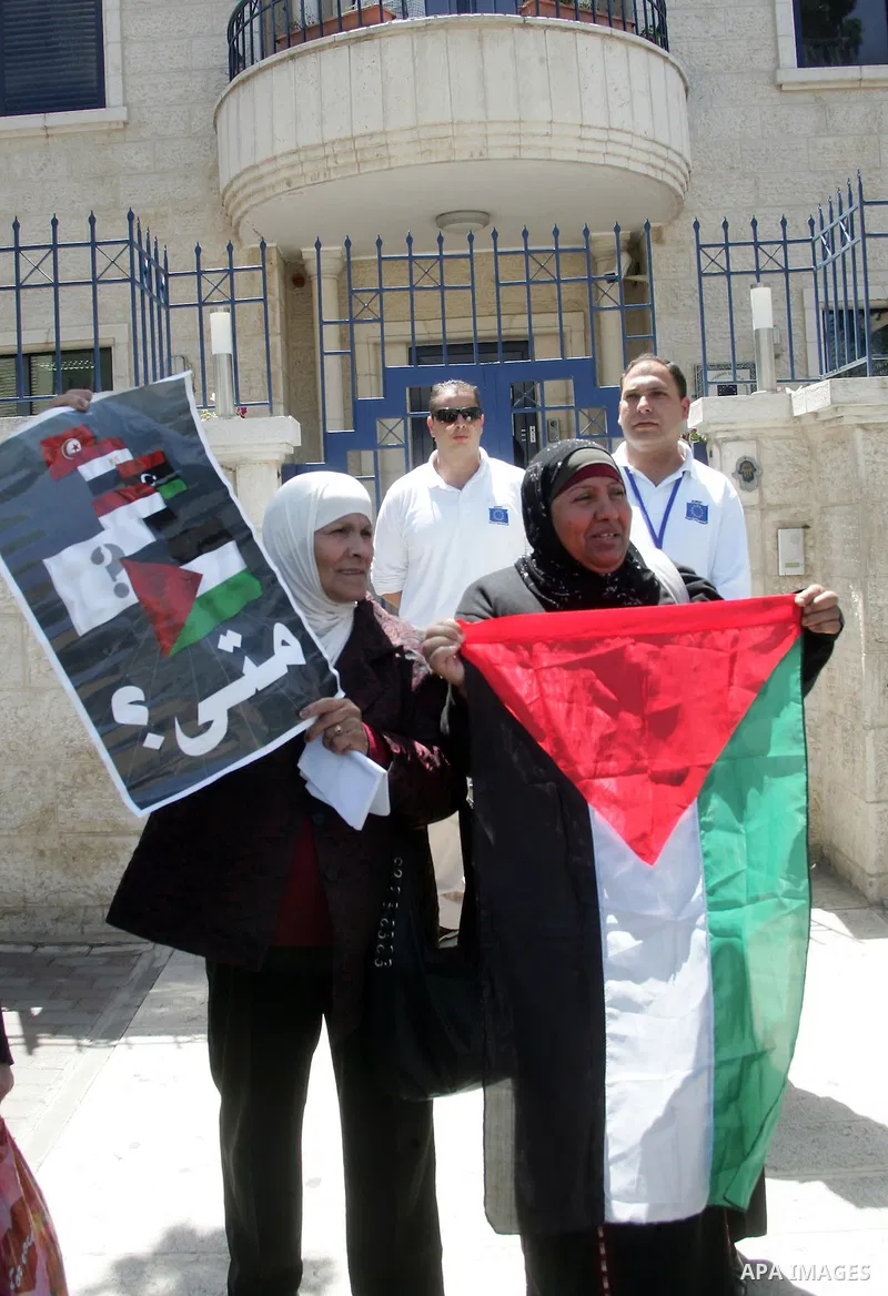 Palestinian take part in a protest in front of the European Commission in the French Hill in Jerusalem on the ongoing attacks on the Gaza Strip on April 11 2011.Photo by Mahfouz Abu Turk
