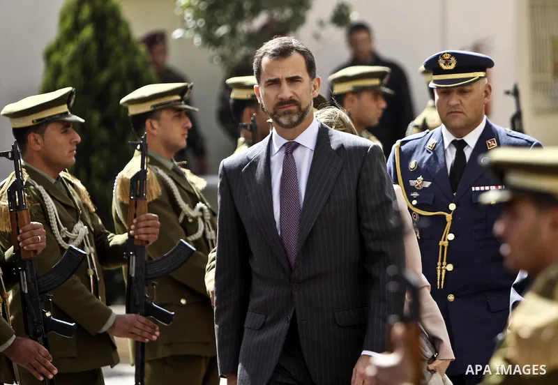 Spanish Prince Felipe during the welcome ceremony as they arrive to the West Bank town of Ramallah, 12 April 2011. Prince Felipe and his wife Princess Letizia are in official visit to the Palestinian territories. Photo b...