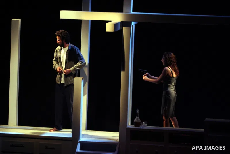 Palestinians perform scenes from the play "The Death of the Virgin" at the conclusion of the Festival "Days of lighthouse" in the West Bank city of Ramallah April 13, 2011. Photo by Issam Rimawi