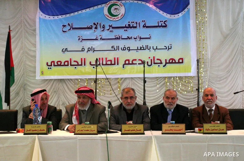 Palestinian members of Hamas' Parliamentary bloc participate in a celebration to support the Palestinian universities students in Gaza city on April 14,2011. Photo by Mohammed Asad
