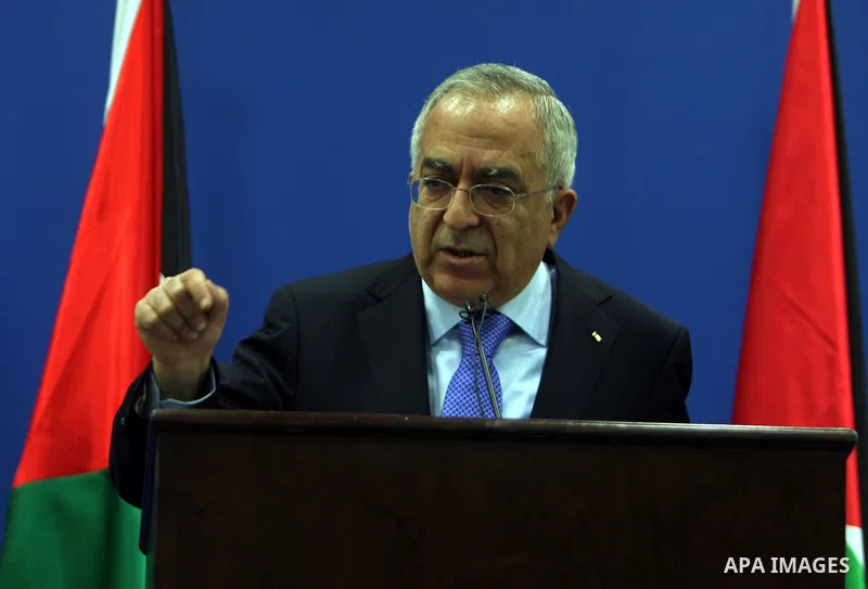 Palestinian Prime Minister Salam Fayyad addressing the media during a press conference at his office in the West Bank town of Ramallah, about the results of the donors meeting held in Brussels, on 14 April 2011, Fayyad m...