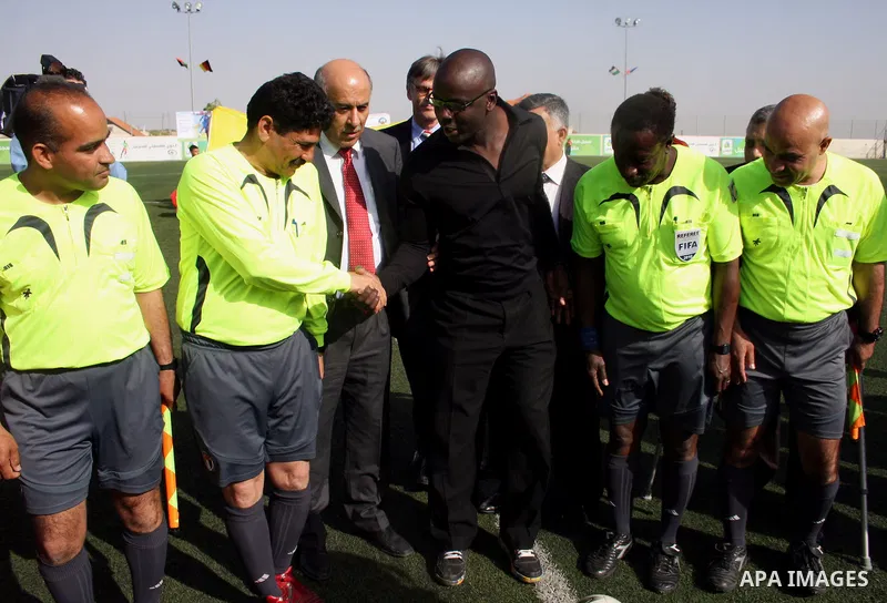 Former French football player Lilian Thuram and the Palestinian Football Association chairman Jibril Rajoub attend the inauguration of a 9,000-capacity stadium, at Al-Bireh, on the outskirts of the West Bank political an...
