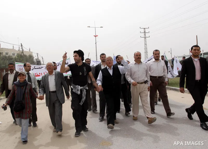 This file photo taken on March 14, 2010 shows the Italian journalist Victor (wears hat) participates in a protest against the blockade on Gaza in Beit Hanoun, near the Erez Crossing between Gaza Strip and Israe. A Salafi...