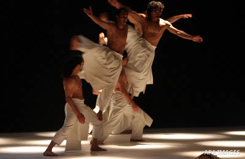 Dancers from Herve Koubi Company from France and Algeria perform their piece 'El Din: ce que le jour doit a la nuit' during the opening of Ramallah Contemporary Dance Festival at Ramallah Cultural Palace in the West Bank...