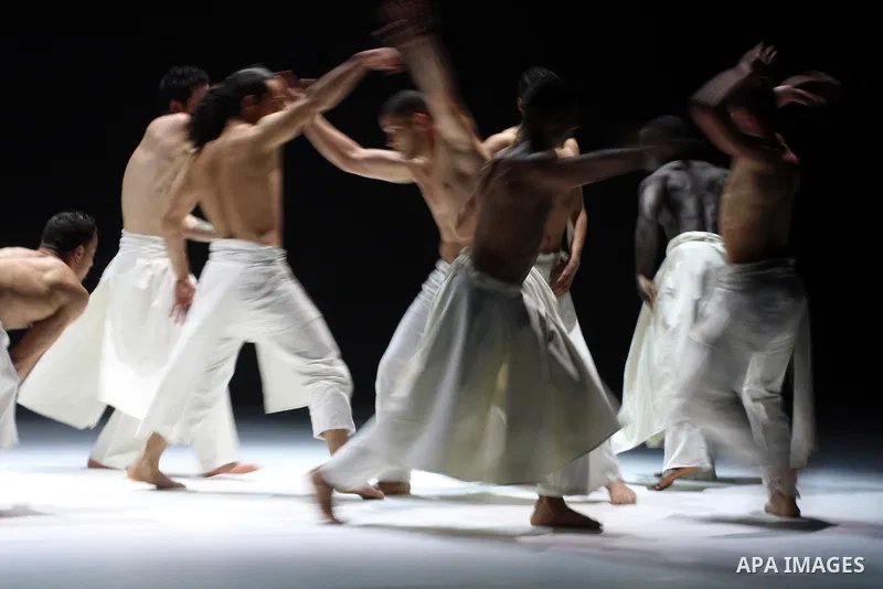 Dancers from Herve Koubi Company from France and Algeria perform their piece 'El Din: ce que le jour doit a la nuit' during the opening of Ramallah Contemporary Dance Festival at Ramallah Cultural Palace in the West Bank...