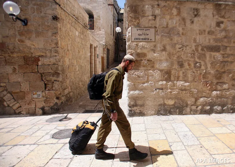 Jewish settler walks in the Jewish Quarter in the Old City in East Jerusalem on April 14 2011. Photo by Sliman Khader