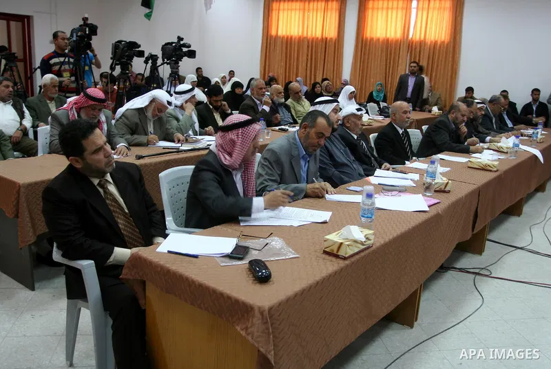 Palestinian Parliament members attend a meeting at the Prisoners Ministry headquarters to mark the Prisoner Day in Gaza city on April 16,2011. Photo by Mohammed Asad