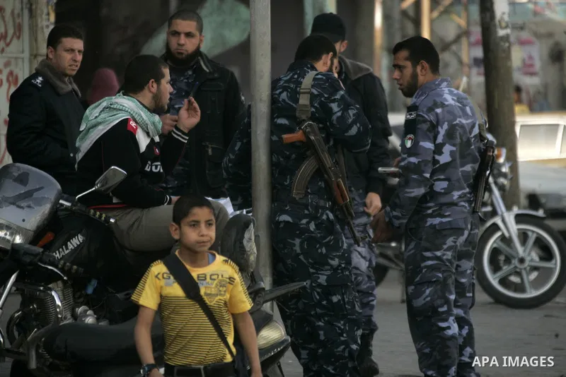 Members of Hamas' security forces patrol in the Gaza border town of Rafah, on April 16, 2011, after a radical Islamist group killed an Italian activist just hours after kidnapping him. The Hamas government said today it...