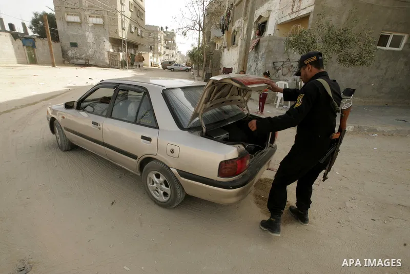 Members of Hamas' security forces patrol in the Gaza border town of Rafah, on April 16, 2011, after a radical Islamist group killed an Italian activist just hours after kidnapping him. The Hamas government said today it...