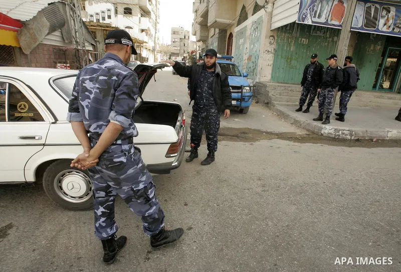 Members of Hamas' security forces patrol in the Gaza border town of Rafah, on April 16, 2011, after a radical Islamist group killed an Italian activist just hours after kidnapping him. The Hamas government said today it...