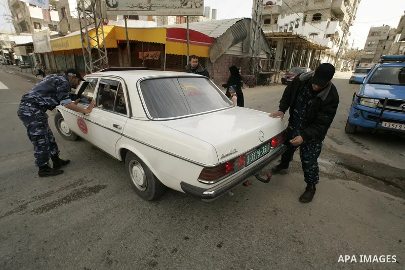 Members of Hamas' security forces patrol in the Gaza border town of Rafah, on April 16, 2011, after a radical Islamist group killed an Italian activist just hours after kidnapping him. The Hamas government said today it...