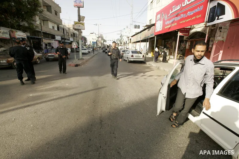 Members of Hamas' security forces patrol in the Gaza border town of Rafah, on April 16, 2011, after a radical Islamist group killed an Italian activist just hours after kidnapping him. The Hamas government said today it...