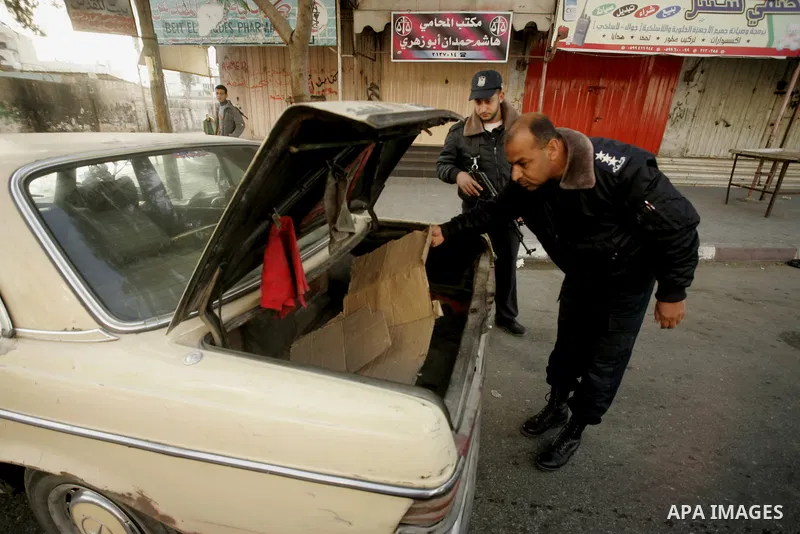 Members of Hamas' security forces patrol in the Gaza border town of Rafah, on April 16, 2011, after a radical Islamist group killed an Italian activist just hours after kidnapping him. The Hamas government said today it...