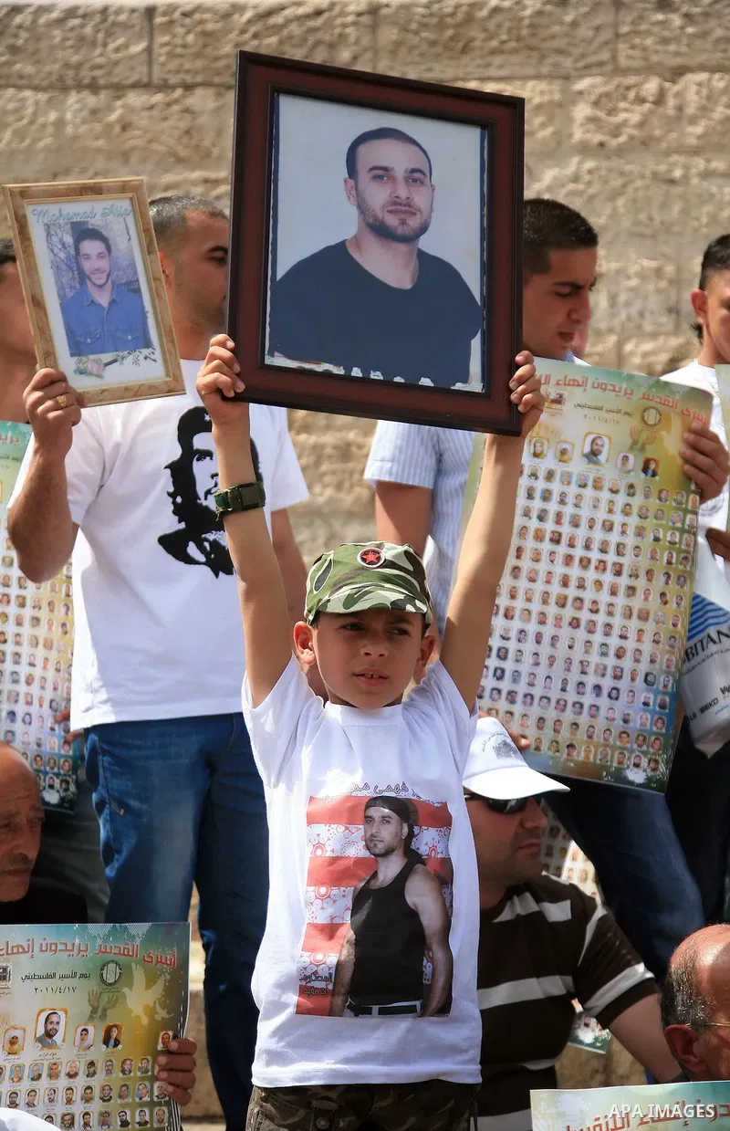 March from the Damascus Gate in East Jerusalem to the Red Cross headquarters where the Palestinian Legislative Council sitters since 290 days, demanding the release of prisoners from Israeli jails. April 16 2011. Sliman...
