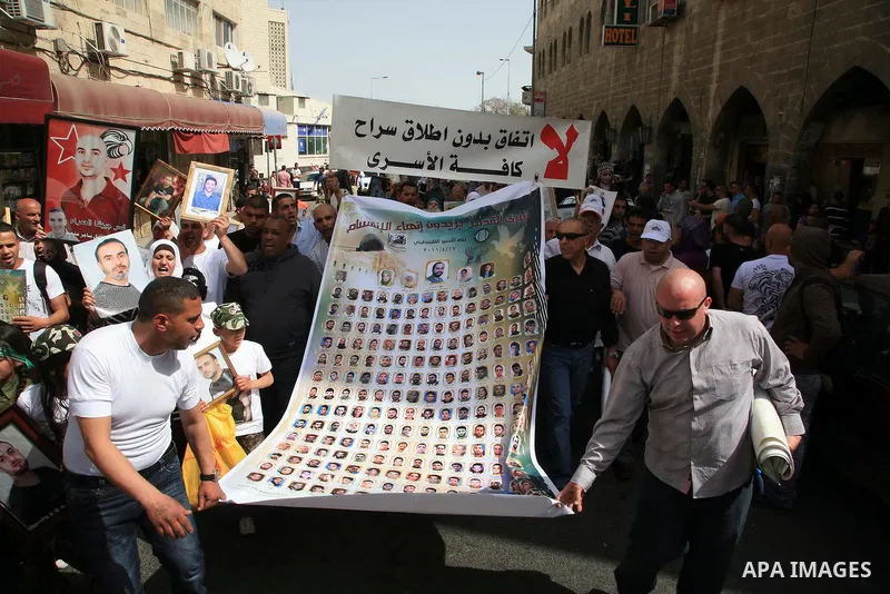 March from the Damascus Gate in East Jerusalem to the Red Cross headquarters where the Palestinian Legislative Council sitters since 290 days, demanding the release of prisoners from Israeli jails. April 16 2011. Sliman...