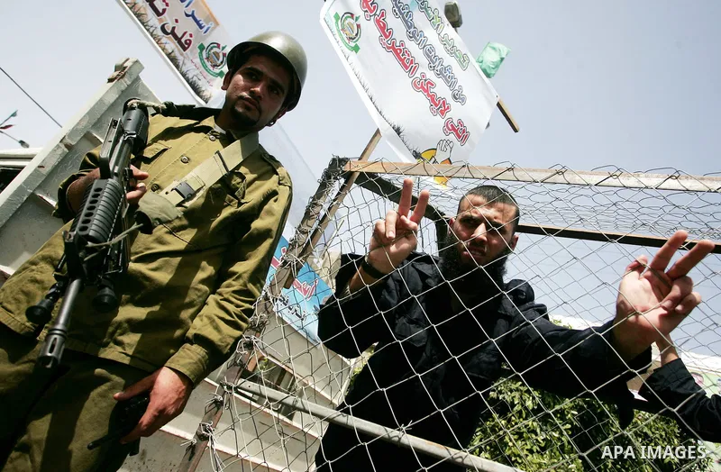 Palestinians participate in a rally, one of several taking place across the Israeli occupied West Bank and Gaza Strip, calling for the release of Palestinians being held in Israeli jails, as they mark Palestinian Prisone...