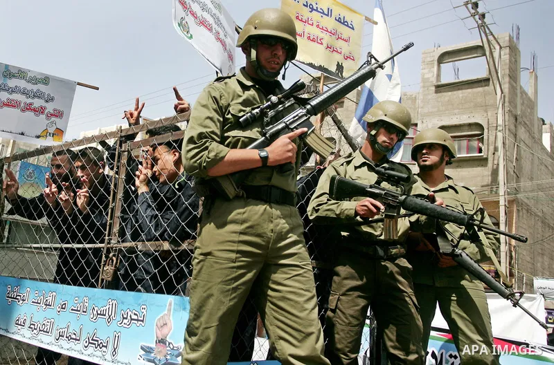 Palestinians participate in a rally, one of several taking place across the Israeli occupied West Bank and Gaza Strip, calling for the release of Palestinians being held in Israeli jails, as they mark Palestinian Prisone...