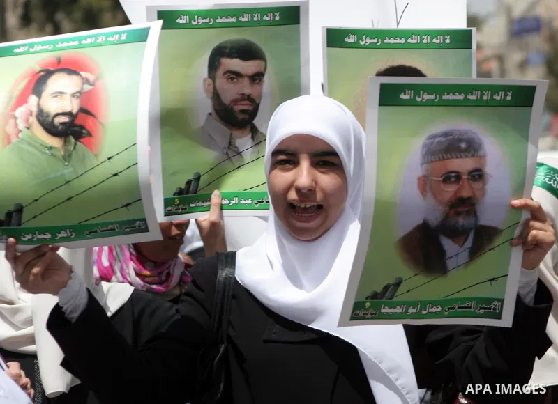 Palestinians take part in a rally, one of several taking place across the Israeli occupied West Bank and Gaza Strip calling for the release of Palestinians being held in Israeli jails, as they mark Palestinian Prisoner's...