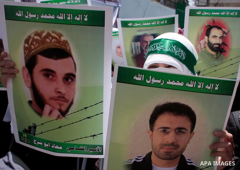 Palestinians take part in a rally, one of several taking place across the Israeli occupied West Bank and Gaza Strip calling for the release of Palestinians being held in Israeli jails, as they mark Palestinian Prisoner's...