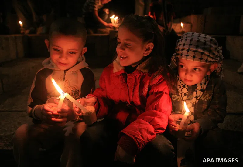 Palestinians light candles during a protest to mark Prisoner's Day in front Damascus Gate in Jerusalem's old city, Sunday, April 17, 2011. Some 5,500 Palestinians are held in Israeli prisons according to figures compiled...