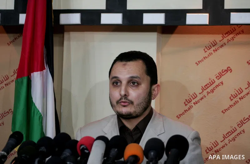 The spokesman of Interior Ministry, Ehab al-Ghousaen speaks to media after Two of the main suspects in the killing of Vittorio Arrigoni in the Gaza Strip were killed during a raid by Hamas security forces seeking to deta...