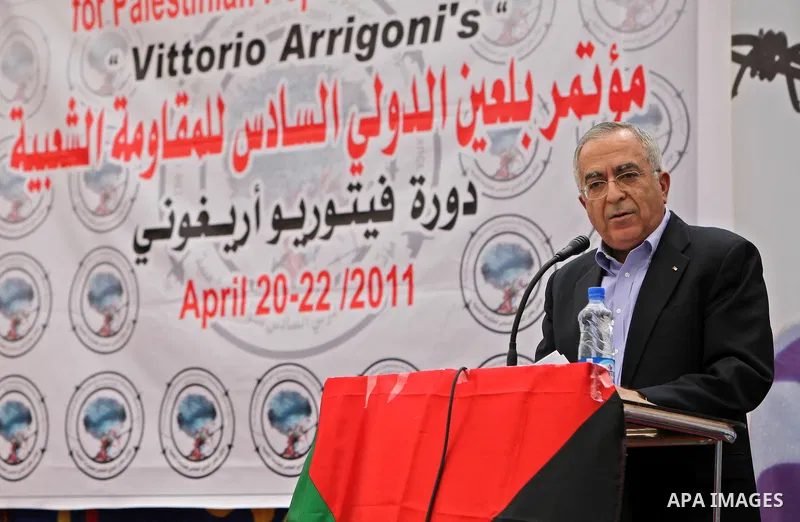 Palestinian Pime Minister, Salam Fayyad attends the opening ceremony of the Bilin 6th international conference in the West Bank city of Ramallah on April 20,2011. Photo by Mustafa Abu Dayeh