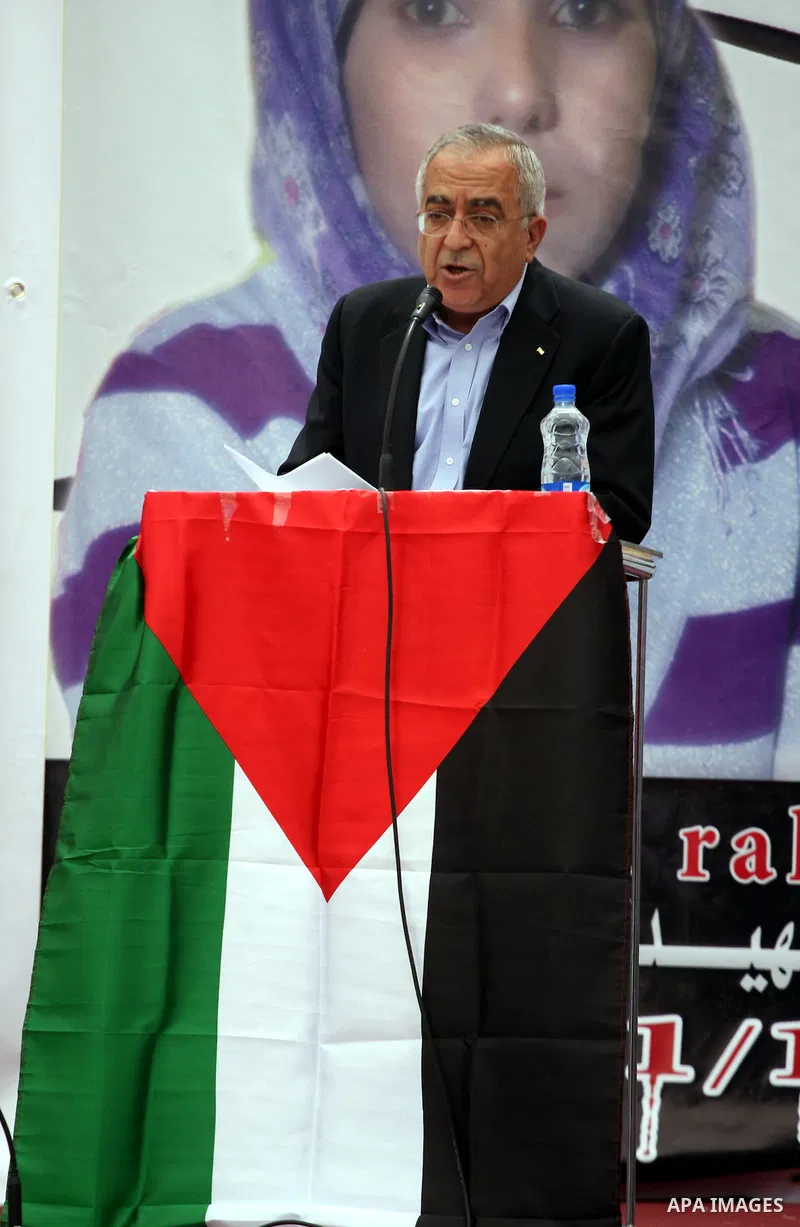 Palestinian prime minister Salam Fayyad participates the opening ceremony of the 6th Bilin international conference for Palestinian Popular Resistance on April 20, 2011 in West Bank village of Bilin, near Ramallah. Fayya...