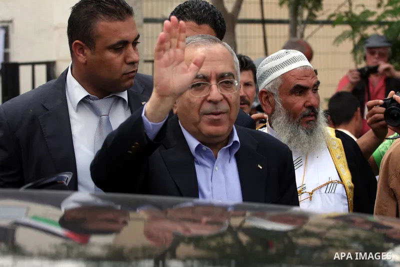 Palestinian prime minister Salam Fayyad participates the opening ceremony of the 6th Bilin international conference for Palestinian Popular Resistance on April 20, 2011 in West Bank village of Bilin, near Ramallah. Fayya...