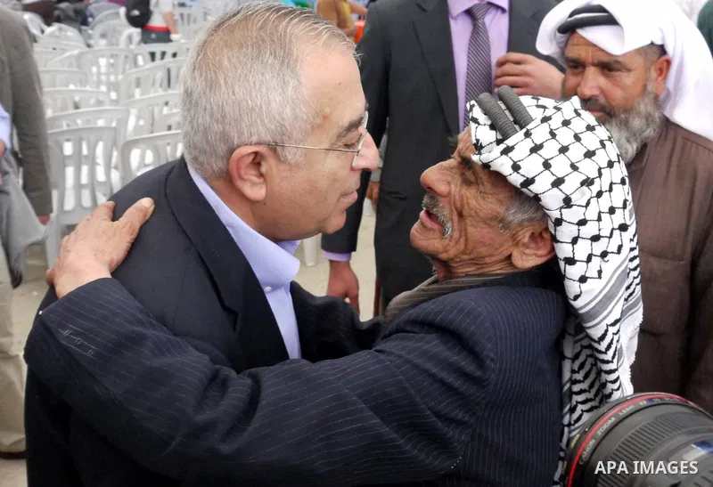 Palestinian prime minister Salam Fayyad participates the opening ceremony of the 6th Bilin international conference for Palestinian Popular Resistance on April 20, 2011 in West Bank village of Bilin, near Ramallah. Fayya...