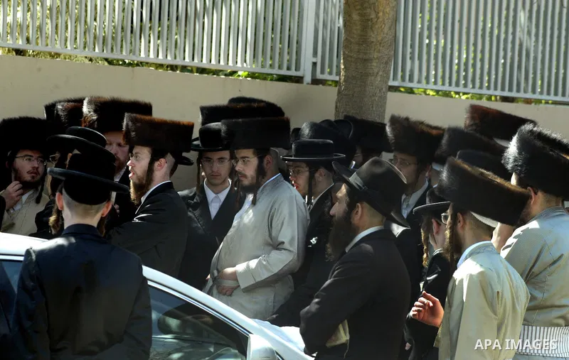 Ultra-Orthodox demonstrators scuffle with police during a protest near Tel Aviv April 21, 2011. protest against the excavation of graves. photo by MAhfouz Abu Turk