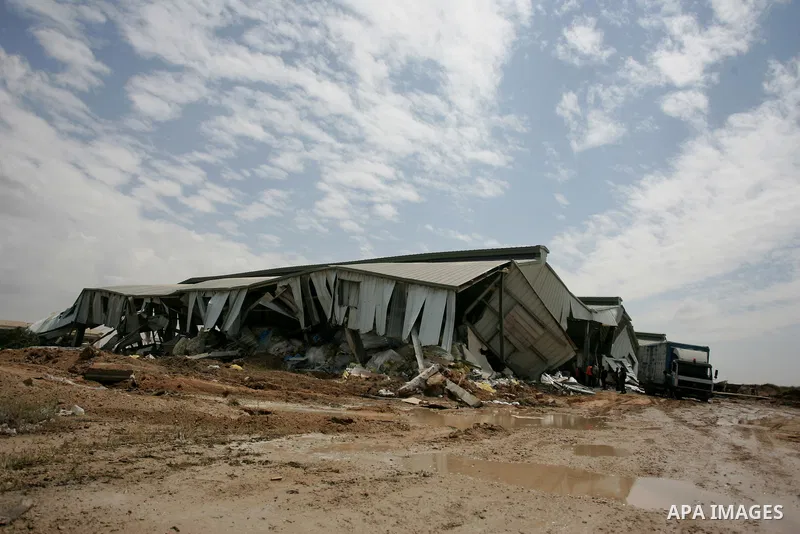 A picture shows the damage after Israeli troops entered the Gaza Strip briefly on April 21, 2011 and demolished several buildings that the military said were being used by "terrorist organisations." Palestinians said the...