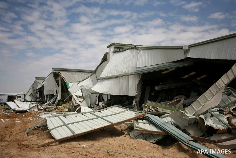 A picture shows the damage after Israeli troops entered the Gaza Strip briefly on April 21, 2011 and demolished several buildings that the military said were being used by "terrorist organisations." Palestinians said the...
