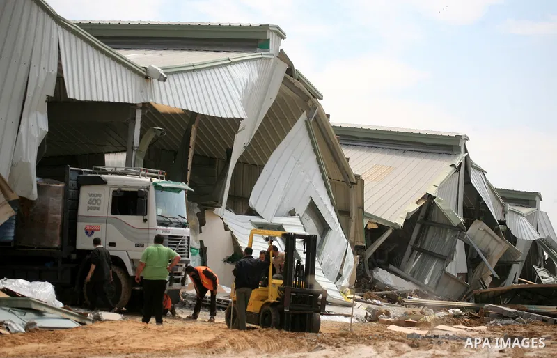 A picture shows the damage after Israeli troops entered the Gaza Strip briefly on April 21, 2011 and demolished several buildings that the military said were being used by "terrorist organisations." Palestinians said the...