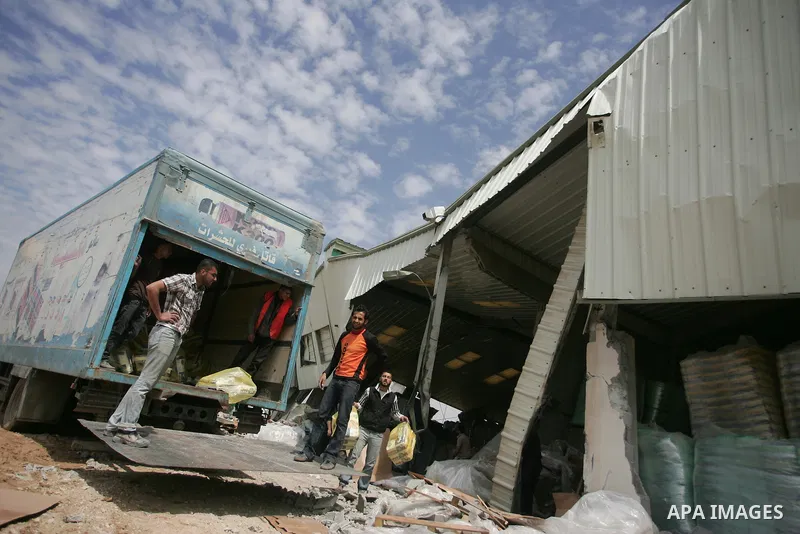 A picture shows the damage after Israeli troops entered the Gaza Strip briefly on April 21, 2011 and demolished several buildings that the military said were being used by "terrorist organisations." Palestinians said the...