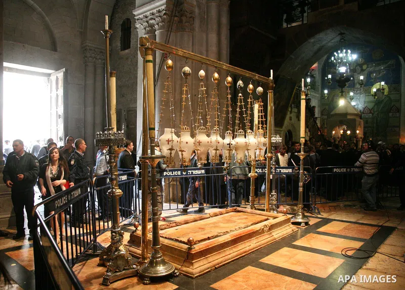 Christians Orthodox take part in Easter "Holy Fire" celebrations on the eve of Easter Sunday on April 23, 2011, at the Church of the Holy Sepulchre, built over the sites where Christians believe Christ was crucified and...