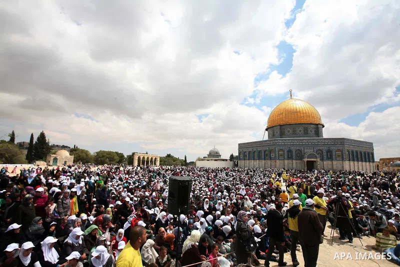 Palestinians take part in a celebration " The box of Al Aqsa child" in front of the Dome of the Rock on the compound known to Muslims as al-Haram al-Sharif, and to Jews as Temple Mount in Jerusalem's Old City on April 23...