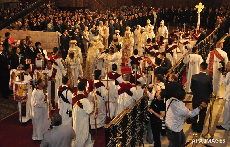 Coptic Christians take part in an Easter service at the main cathedral in Cairo April 23, 2011. This year, the Orthodox and Catholic churches are celebrating Easter on the same date. Photo by Ahmed Asad