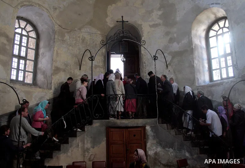 Christian visits and take part the Sunday mass in the Church of the Nativity in the holy West Bank town of Bethlehem April 24, 2011.The church is built over the grotto where Christians believe the Virgin Mary gave birth...