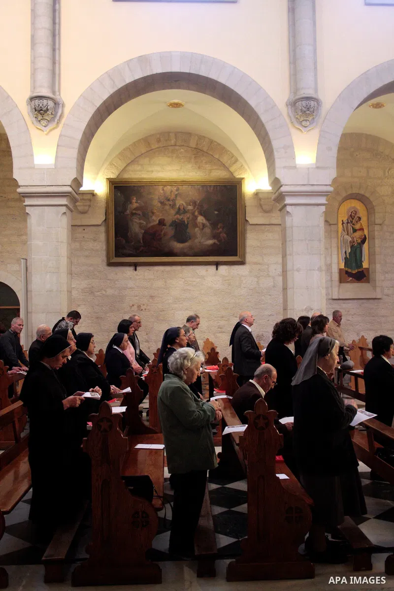 Roman Catholic nuns pray in the Sunday prayer in Saint Catherine in the complex of the Church of the Nativity in the biblical West Bank town of Bethlehem April 24 2011.Photo by Najeh Hashlamoun..