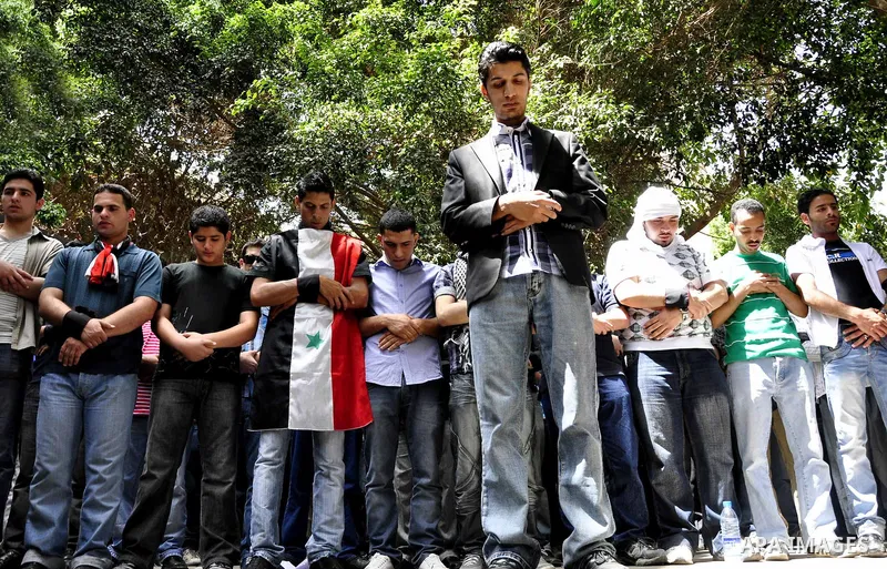 Syrians living in Egypt demonstrate against the recent actions of the Syrian government and in support of protesters, outside the Syrian Embassy on April 26, 2011. Syrian army units deployed in the city of Deraa which ha...
