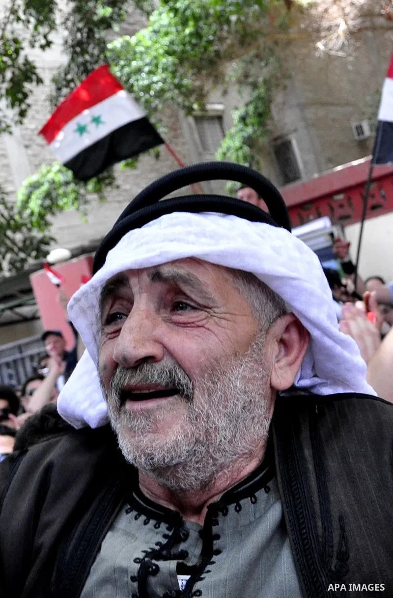 Syrians living in Egypt demonstrate against the recent actions of the Syrian government and in support of protesters, outside the Syrian Embassy on April 26, 2011. Syrian army units deployed in the city of Deraa which ha...