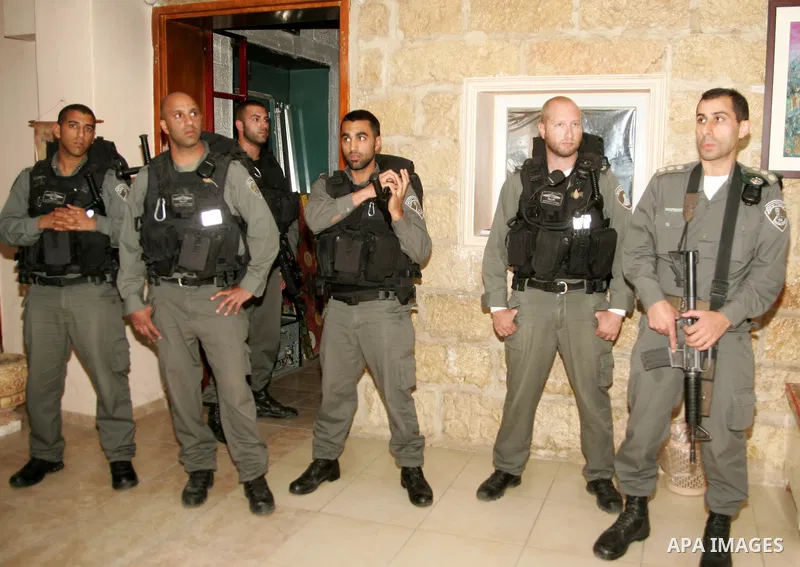 Israeli border officers scuffle with Palestinians at the Palestinian National Theatre in East Jerusalem on April 26,2011. Photo by Mahfouz Abu Turk