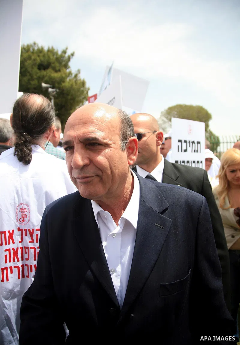 Israeli MK Shaul Mofaz takes part in a protest held by doctors and medical students from all over Israel, outside the Knesset in Jerusalem on April 27,2011 against the poor terms of their employment. Due to their strike...