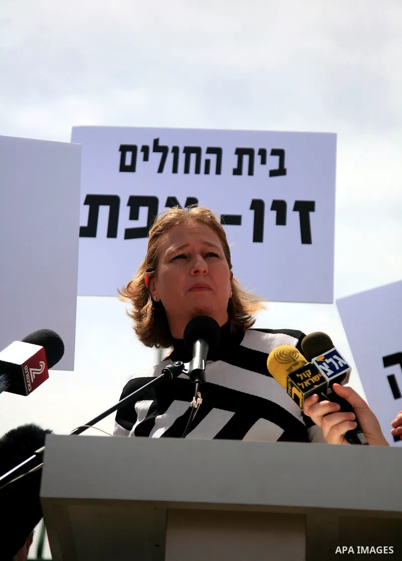 Israeli MK Tzipi Livni takes part in a protest held by doctors and medical students from all over Israel, outside the Knesset in Jerusalem on April 27,2011 against the poor terms of their employment. Due to their strike...
