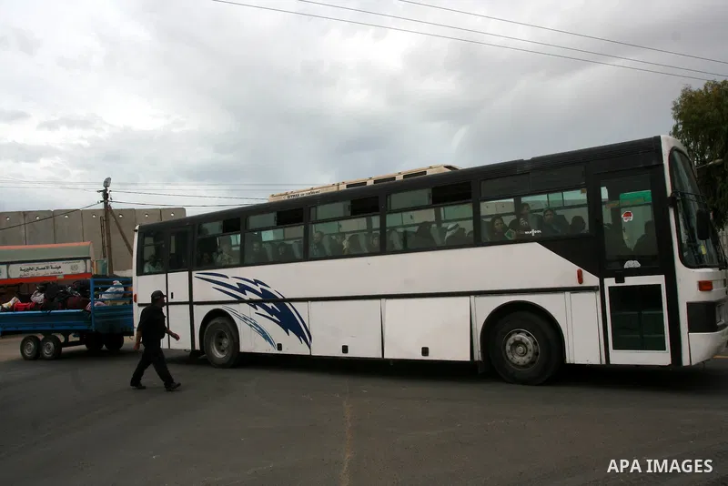 Palestinians ride a bus as they prepare to enter Egypt through Rafah border crossing in their way to Saudi Arabia to perform Ummrah (Religious ritual) on April 28,2011. The Muslims from all over the world visit Holy citi...