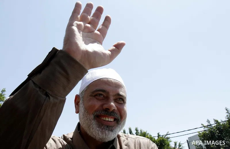 Palestinian Prime Minister in Gaza Strip, Ismail Haniyawaves after a press conference following Friday prayers in Gaza City on April 29, 2011, two days after the Fatah party which dominates the West Bank-based Palestinia...