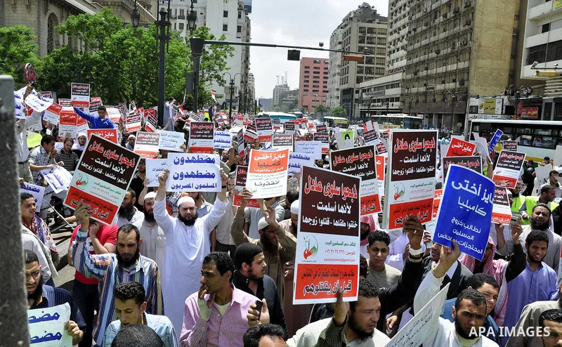 Salafists hold banners calling for the release of Kamilia Shehata, a Muslim woman who according to them is kept by the Coptic Church, during a protest in front of Al Nour mosque in Abbasiya, Cairo, Egypt, 29 April 2011....