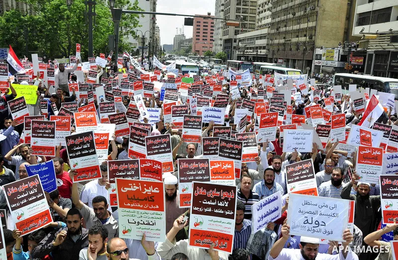 Salafists hold banners calling for the release of Kamilia Shehata, a Muslim woman who according to them is kept by the Coptic Church, during a protest in front of Al Nour mosque in Abbasiya, Cairo, Egypt, 29 April 2011....