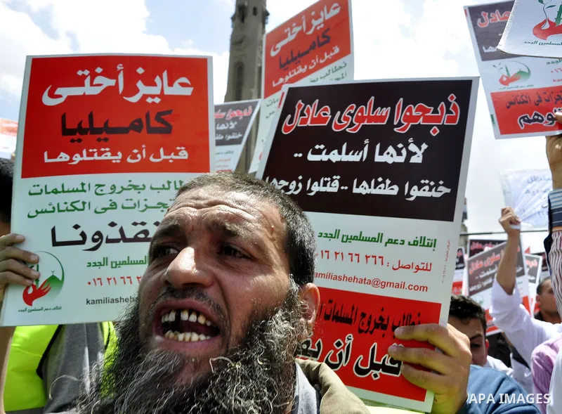 Salafists hold banners calling for the release of Kamilia Shehata, a Muslim woman who according to them is kept by the Coptic Church, during a protest in front of Al Nour mosque in Abbasiya, Cairo, Egypt, 29 April 2011....