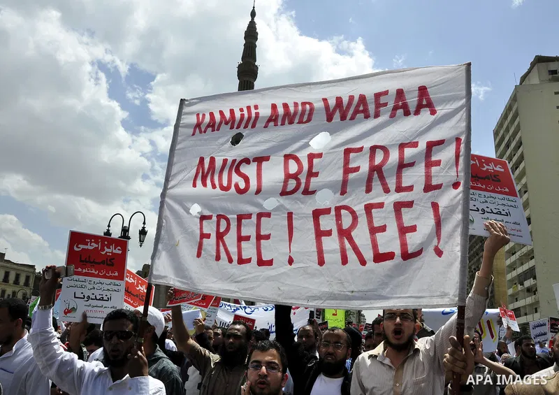 Salafists hold banners calling for the release of Kamilia Shehata, a Muslim woman who according to them is kept by the Coptic Church, during a protest in front of Al Nour mosque in Abbasiya, Cairo, Egypt, 29 April 2011....